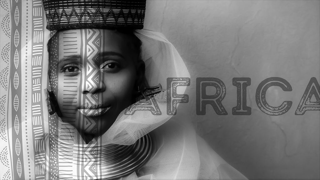 Black and white fine art portrait with bold AFRICA typography overlay, woman in traditional hat and silver neck rings with tribal pattern double exposure