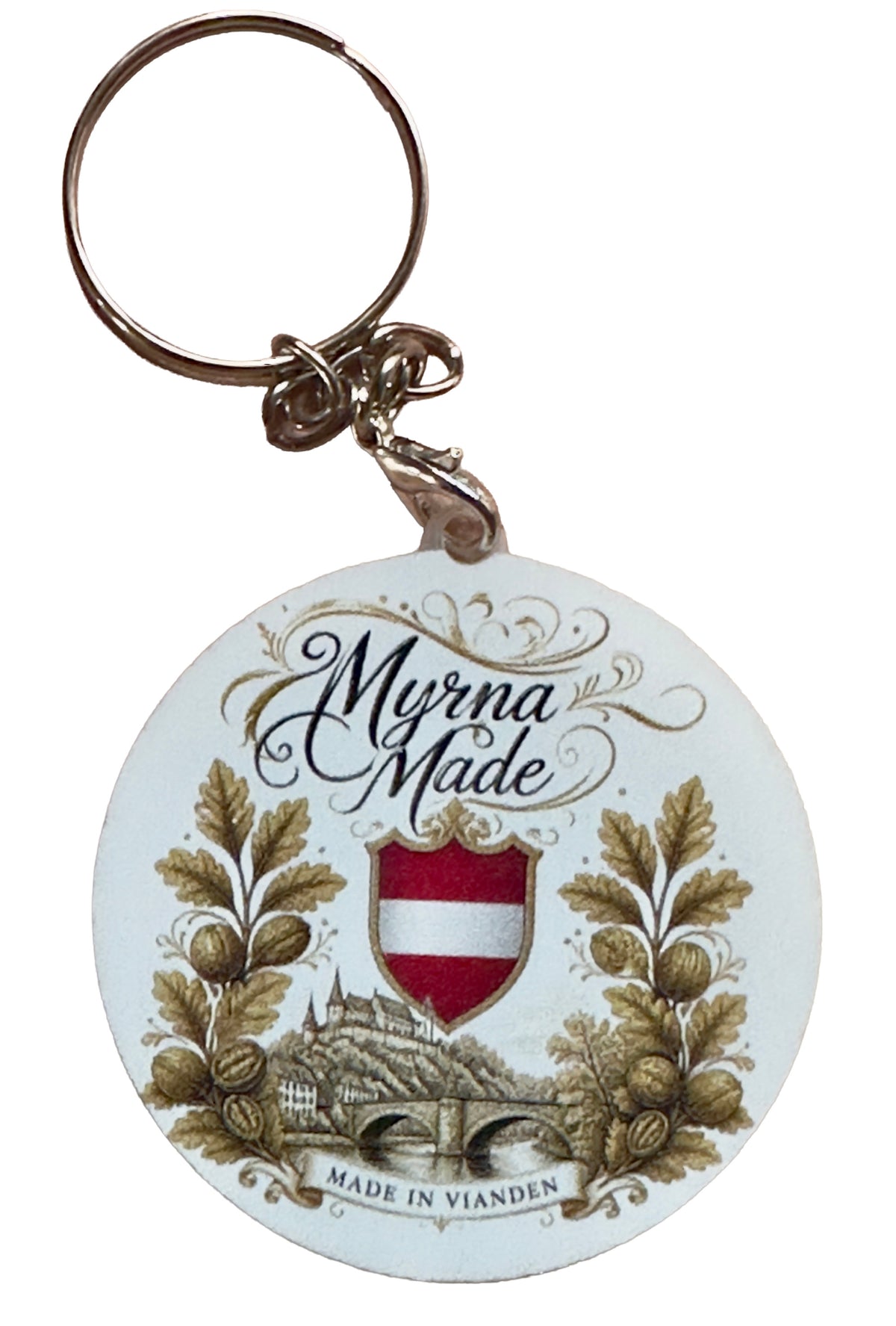Round MyrnaMade keyring with Vianden town scene, red-and-white shield and walnut motifs