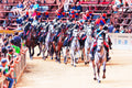 Carabinieri cavalry in ceremonial uniform at the Palio di Siena, led by a woman for the first time in history