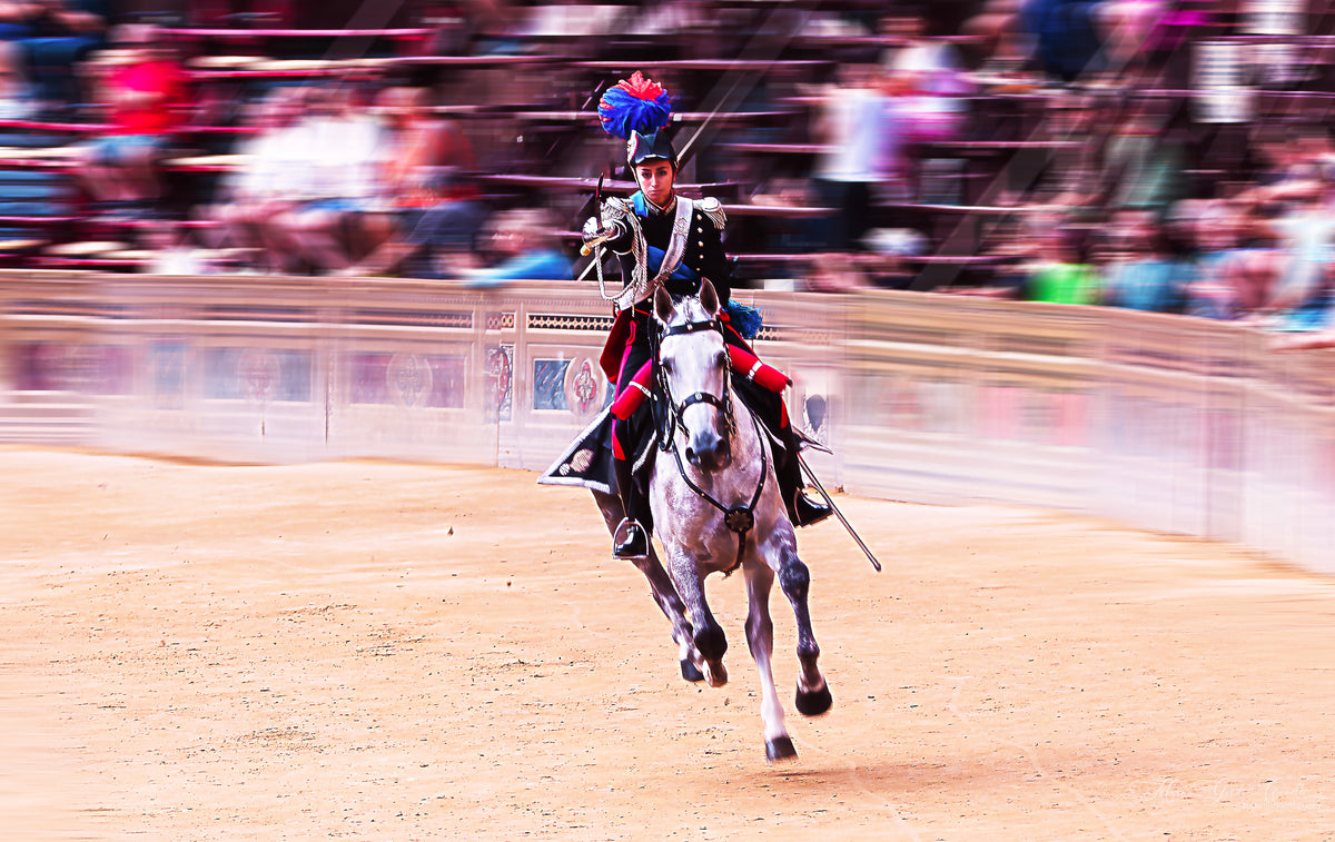 First woman to lead the Carabinieri Charge at the Palio di Siena, in ceremonial uniform on horseback with dramatic motion blur