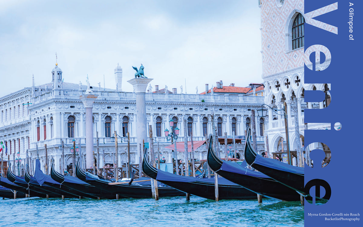 Gondolas moored along the Venice waterfront with San Marco columns and Biblioteca Marciana in the background